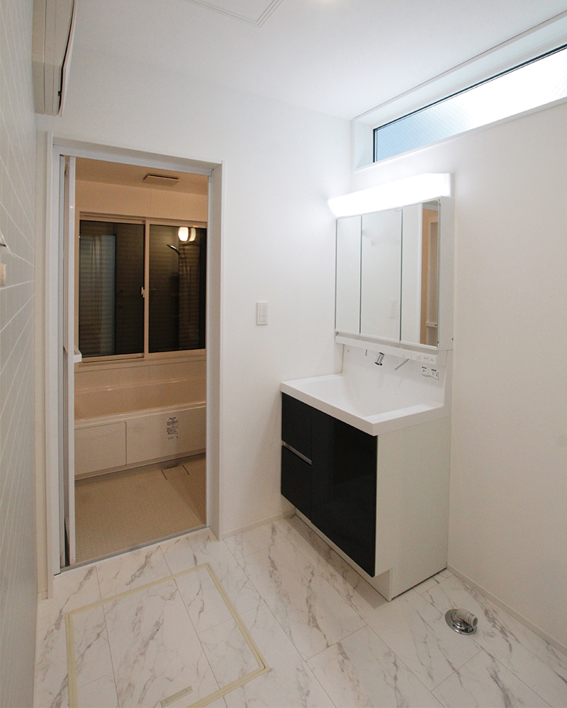 三角変形地で叶える、ガレージで愛車が楽しめる大人カッコイイ家